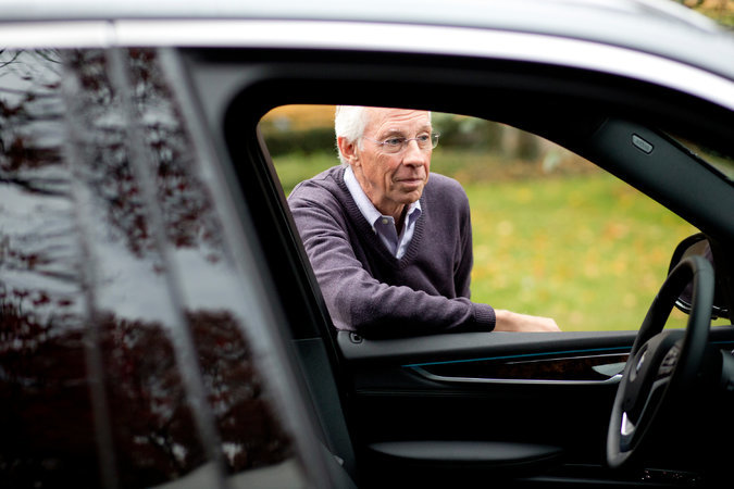 Click to enlarge man and car