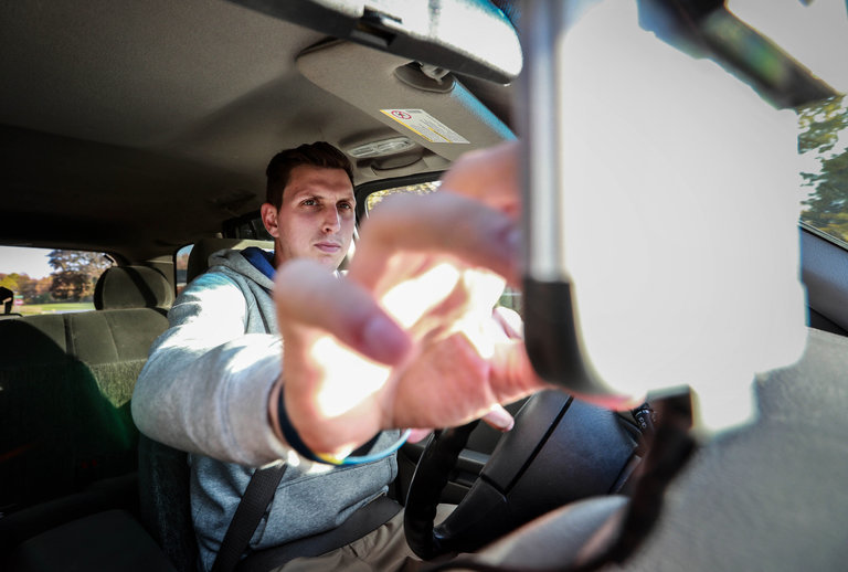 Click to enlarge man in car