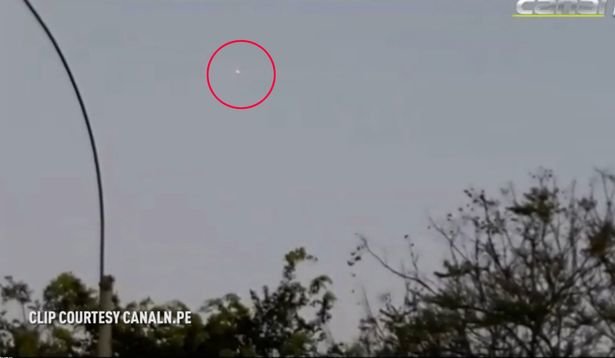 The 'burning' UFO was filmed travelling across the sky above Lima, Peru, for a full minute 