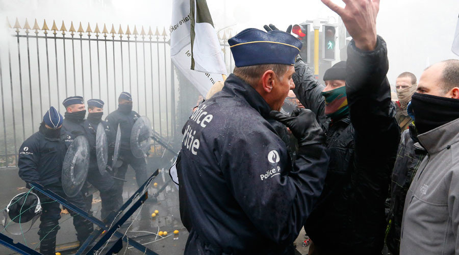 Click to enlarge Belgian soldiers scuffle with police officers during a protest