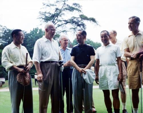 Click to enlarge Nobusuke Kishi and Dwight D. Eisenhower play golf in 1957