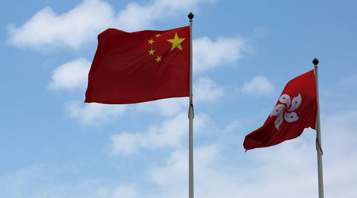 Chinese national flag and a Hong Kong flag