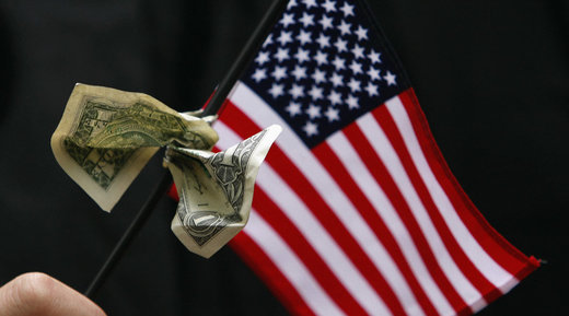 US flag with dollar bill