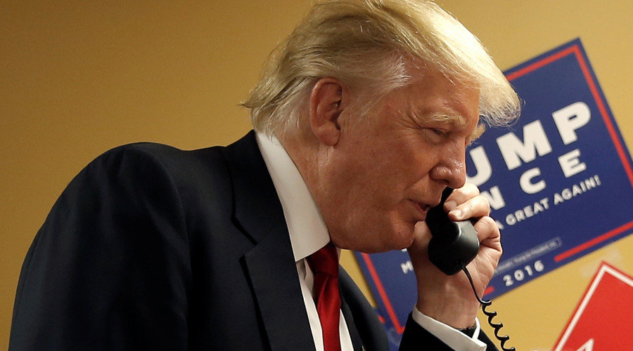 Click to enlarge Donald Trump on phone