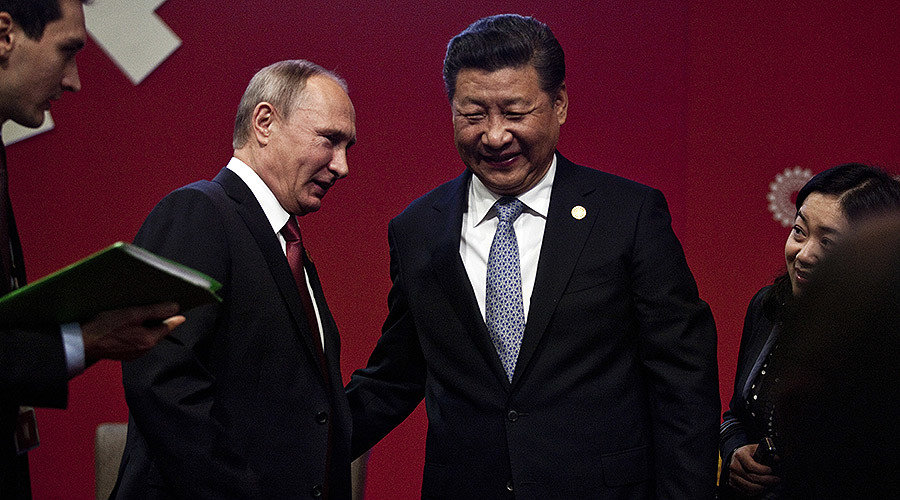 Click to enlarge President Vladimir Putin (2nd L) chatting with China's President Xi Jinping (2nd R) at the start of the ABAC and APEC Leaders' Dialogue at the Asia-Pacific Economic Cooperation (APEC) Summit in Lima