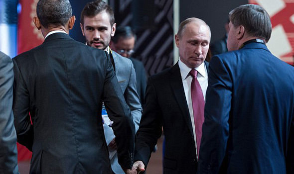 Click to enlarge Putin Obama last handshake