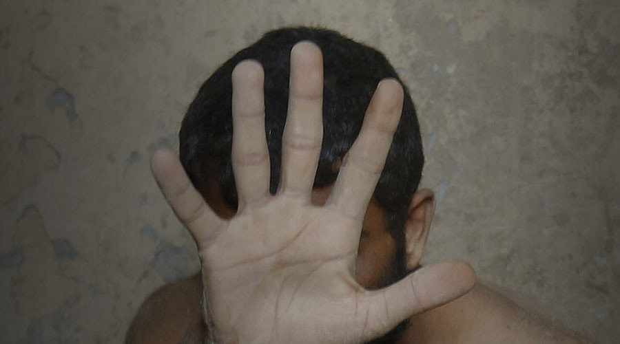 Click to enlarge Man hiding face with hand