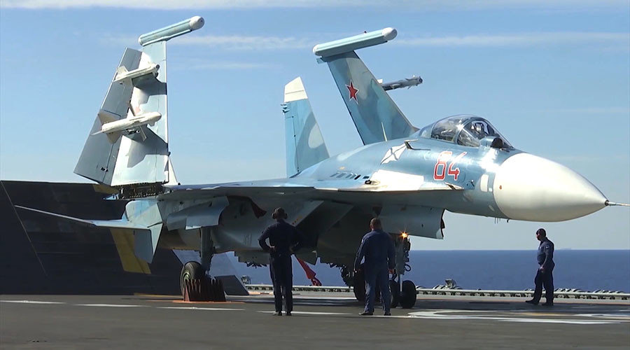 Click to enlarge Su-33 fighter on the deck of Admiral Kuznetsov aircraft carrier