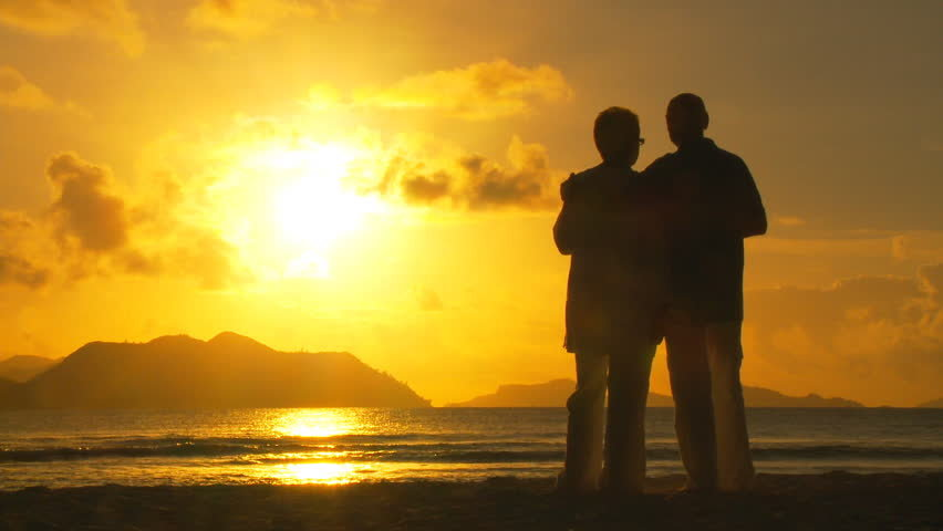elderly couple sunset