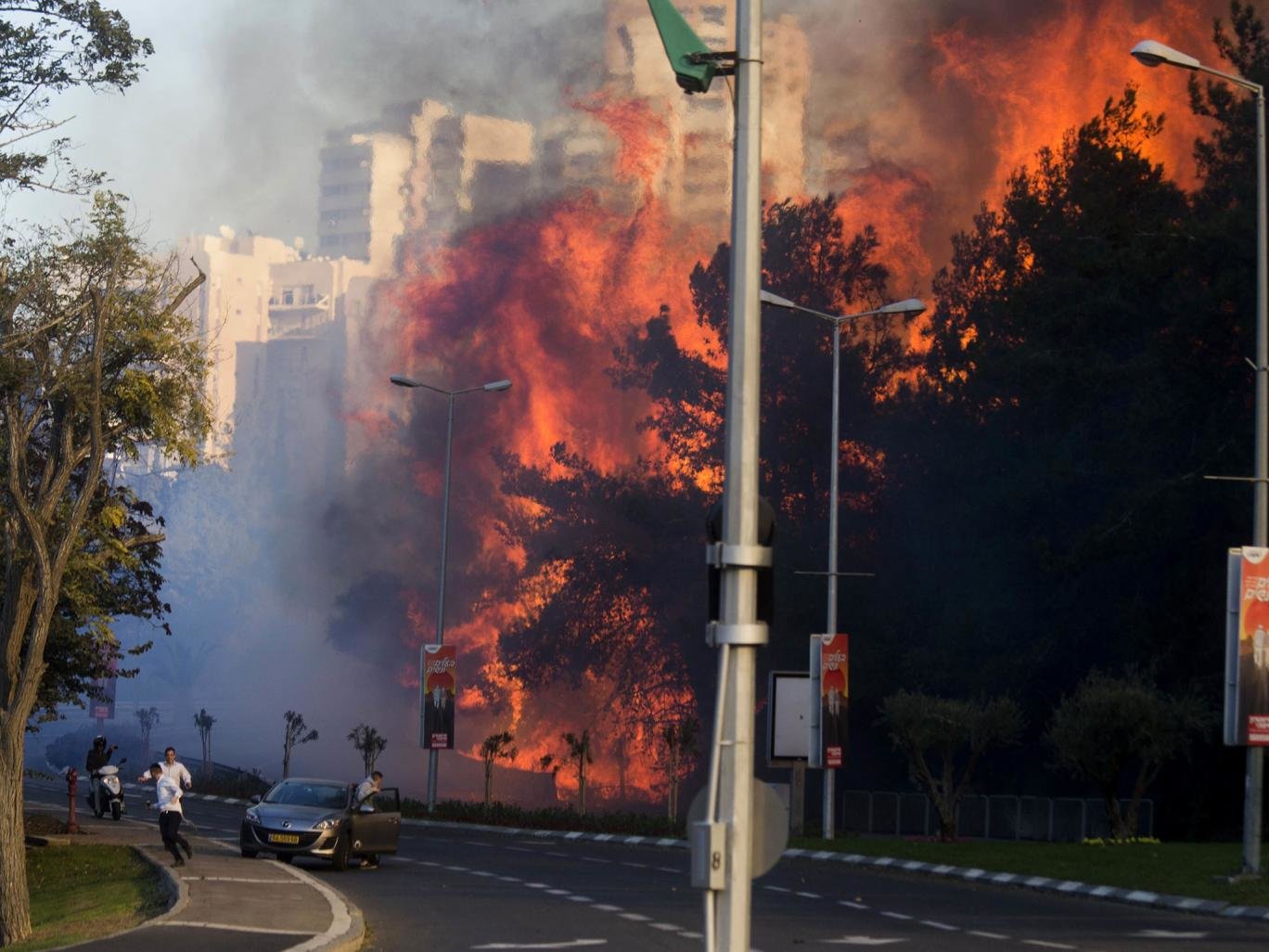 Click to enlarge Wildfires raging through Haifa