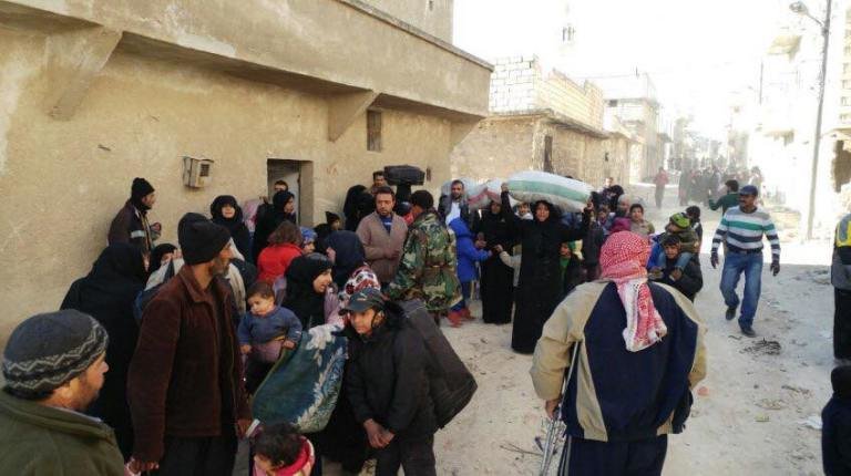 Click to enlarge civilian escaping Aleppo