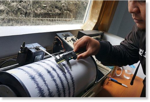 A man mapping the intensity of earthquake