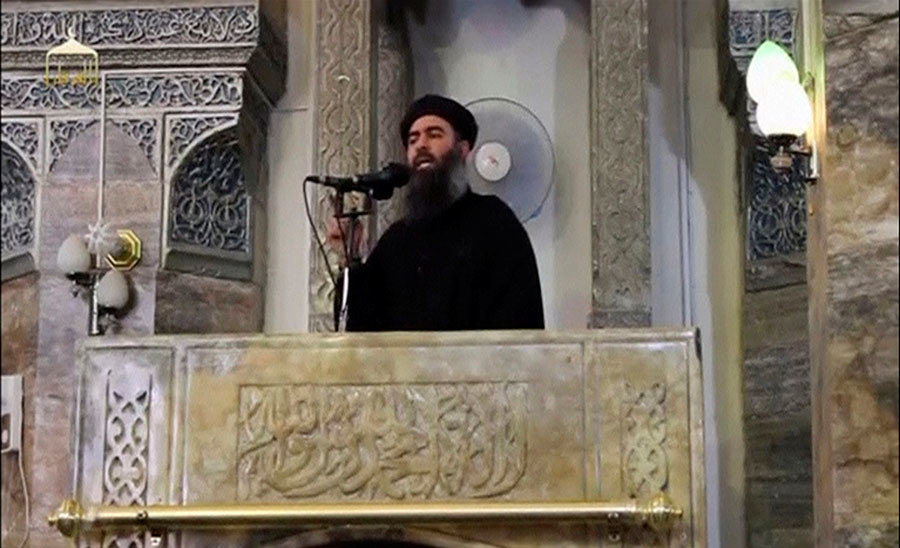 Click to enlarge A man purported to be the reclusive leader of the militant Islamic State Abu Bakr al-Baghdadi