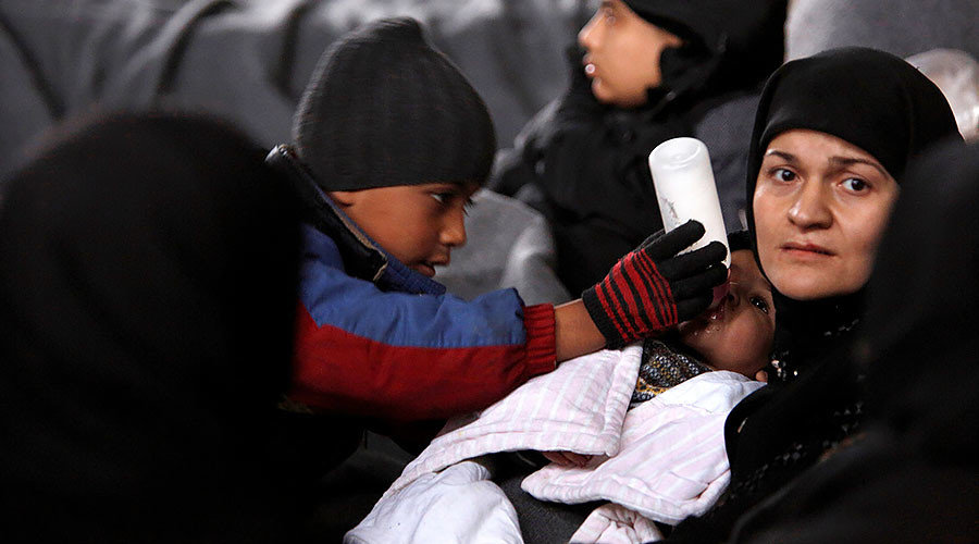 Click to enlarge Syrians evacuated from eastern Aleppo