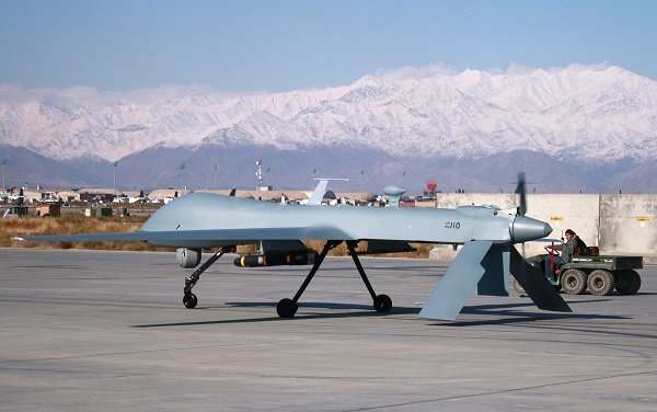 Click to enlarge US Predator unmanned drone armed with a missile