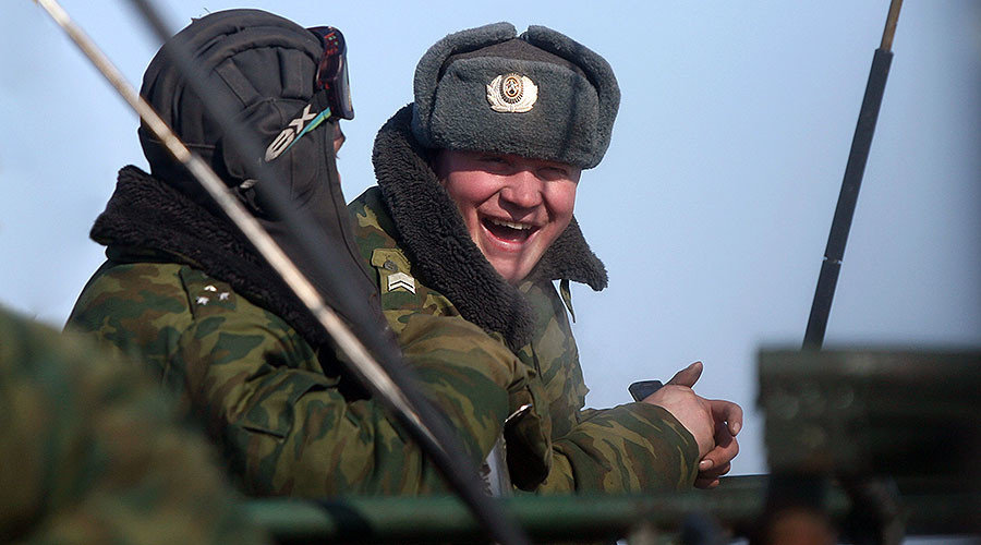 Russian soldiers participating in a live fire tactical exercise