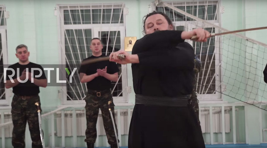 Archpriest Valery Kolesnikov swordplay