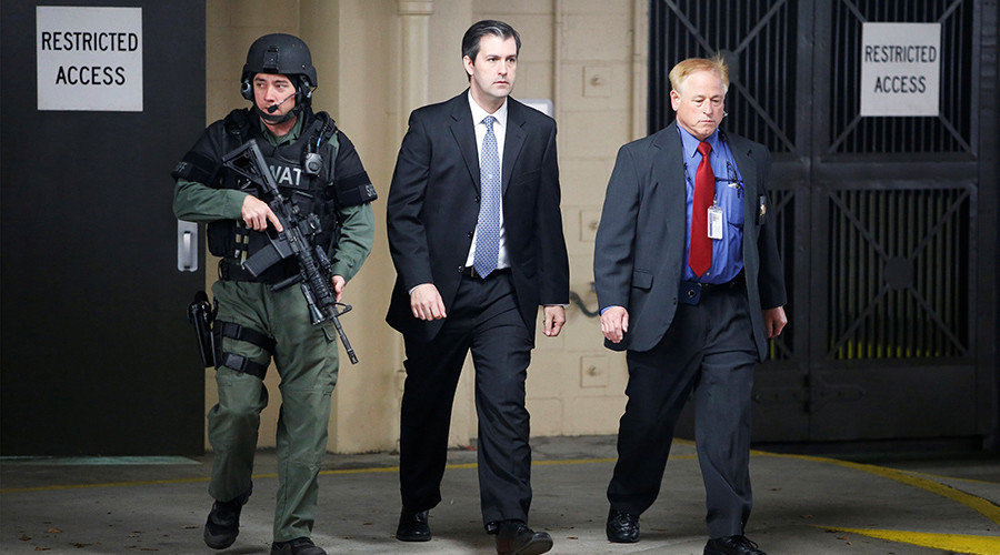 Former North Charleston police officer Michael Slager is escorted from the courthouse by security personnel while waiting on his verdict at the Charleston County Courthouse in Charleston, South Carolina, U.S.