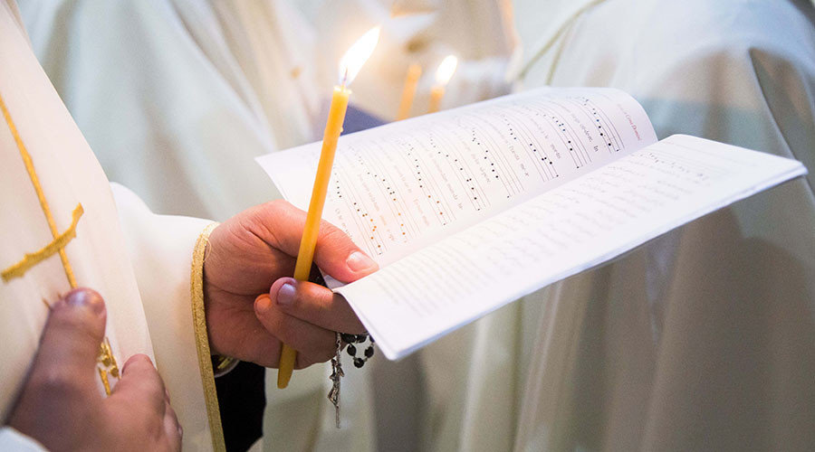 Click to enlarge priest