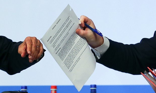 Foreign secretary Johnson holds the document marked sensitive