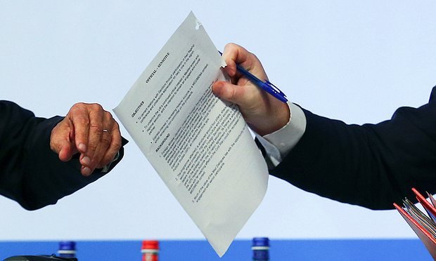 Click to enlarge Foreign secretary Johnson holds the document marked sensitive
