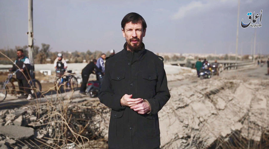 An image grab taken from a propaganda video released on December 7,2016 by Amaq News Agency,a Youtube channel which posts videos from areas under the ISIS group's control,shows John Cantlie,a British journalist kidnapped in Syria four years ago,speaking t