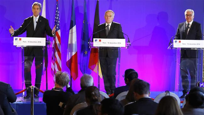 Click to enlarge US Secretary of State John Kerry (L), German Foreign Minister Frank-Walter Steinmeier (R) and France's Foreign Minister Jean Marc Ayrault (C) give a press conference following a meeting with representatives from foreign-sponsored Syrian opposition in Pari