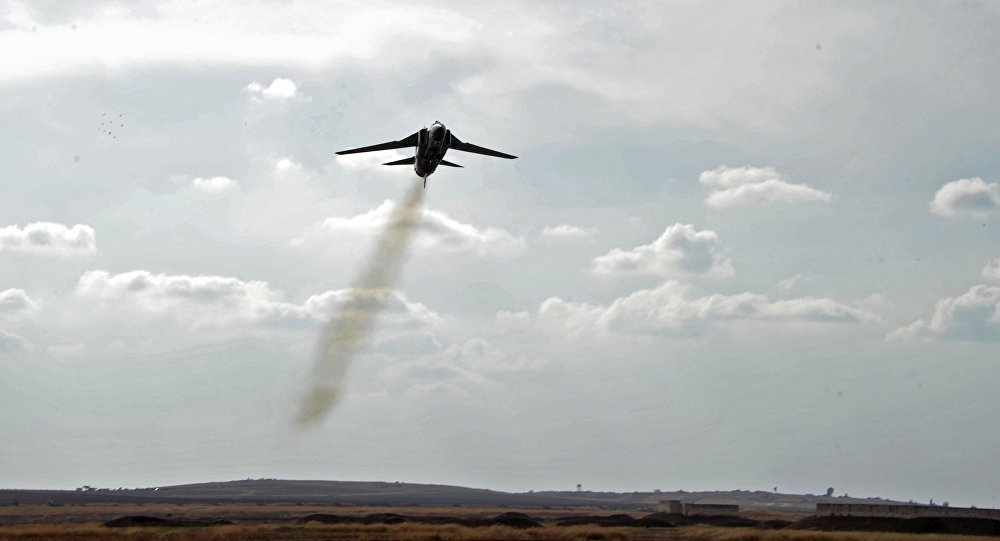 A MiG-23 aircraft of the Syrian Air Force lands at the Hama airbase near the city of Hama, Syria's Hama Province