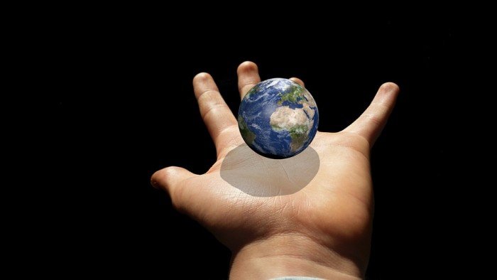 Click to enlarge earth in hand