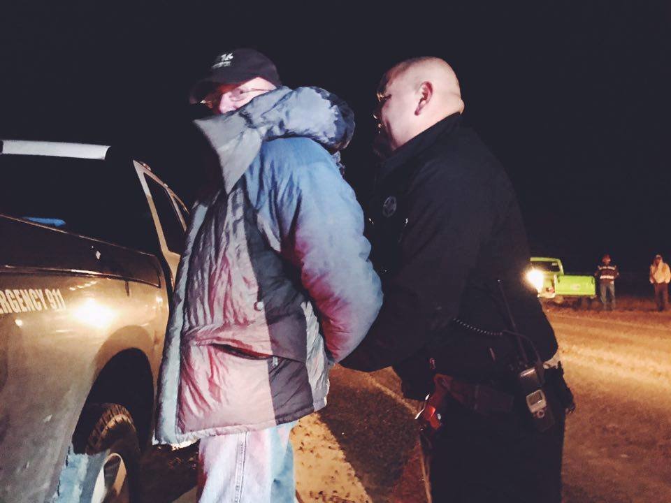 Roger Siglin being arrested for protesting pipeline
