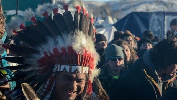 Demonstrators against the North Dakota Access Pipeline celebrate in Oceti Sakowin camp, Dec. 4, 2016