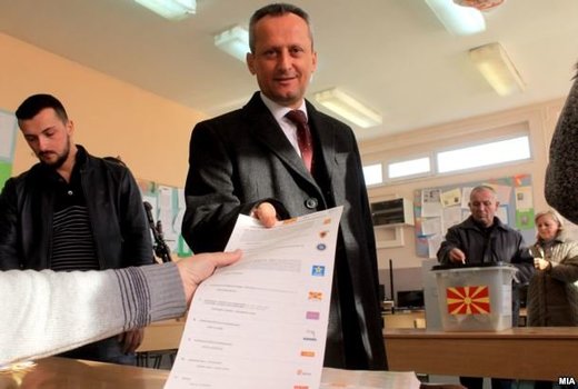 Click to enlarge Parliament speaker Trajko Veljanoski votes at a polling station