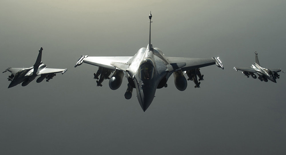 Click to enlarge This photo released on Sunday, Sept.27, 2015 by the French Army Communications Audiovisual office (ECPAD) shows French army Rafale fighters jets flying towards Syria as part of France's Operation Chammal launched in September 2015 in support of the US-led
