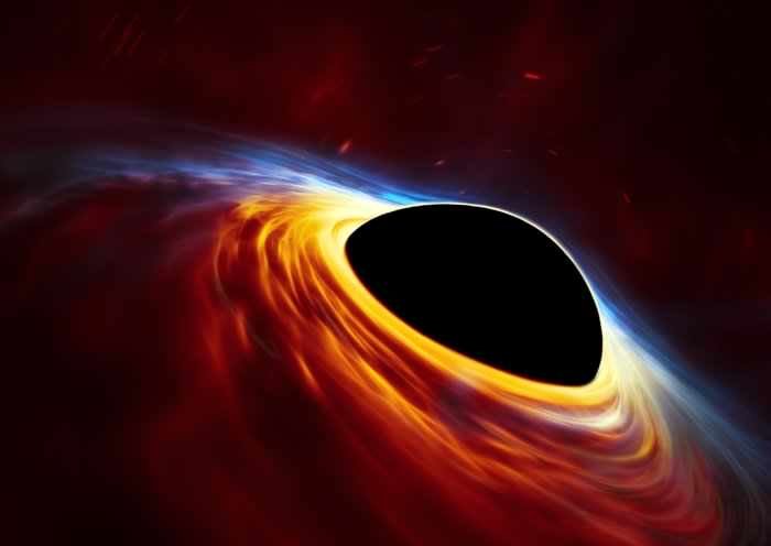 Click to enlarge Supermassive black hole eating star