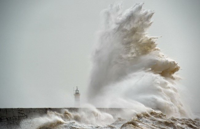 Wave crashing ashore