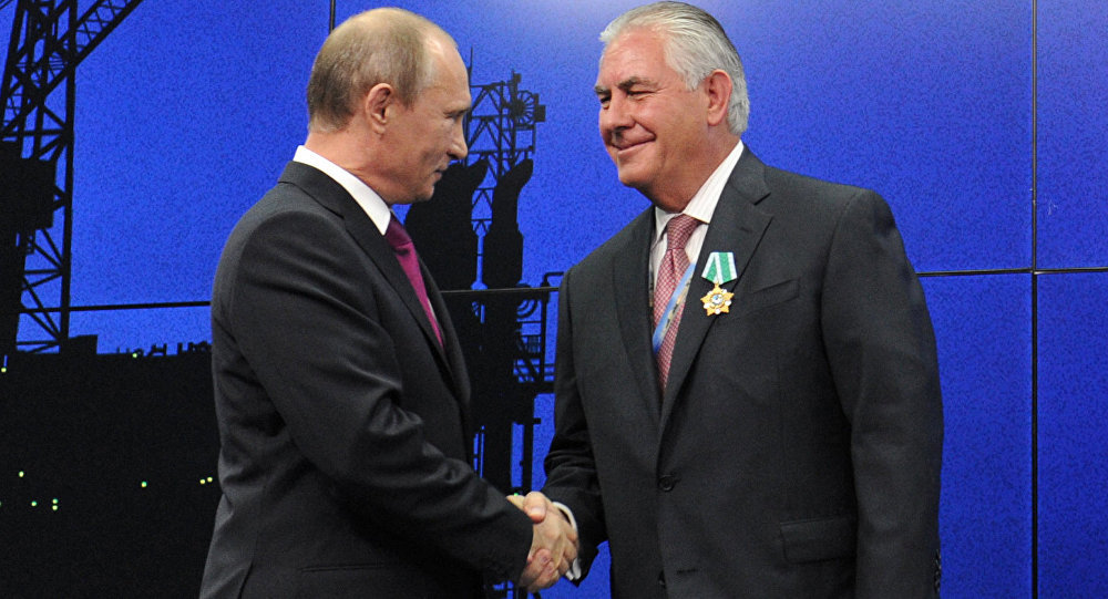 Click to enlarge Vladimir Putin and Rex Tillerson