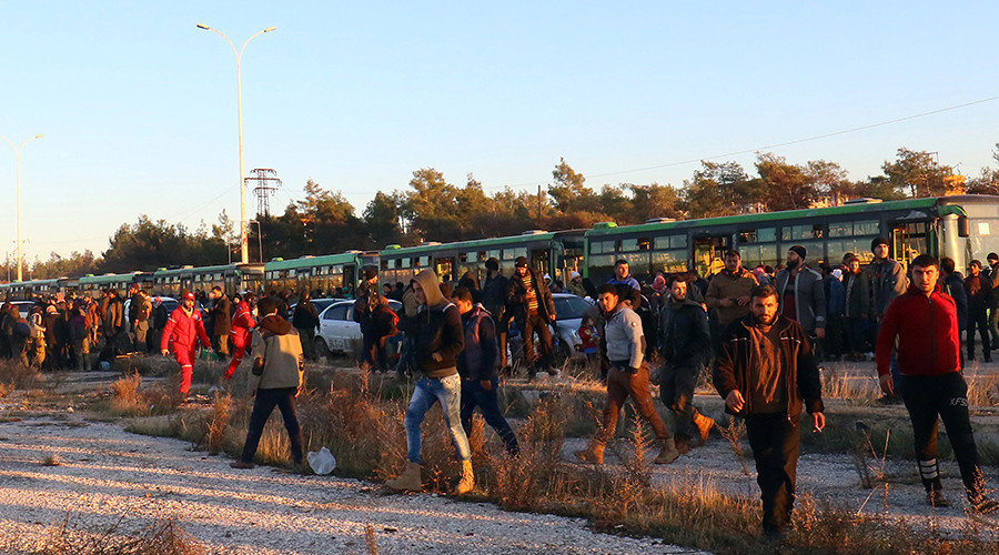 Evacuees from rebel-held east Aleppo, disembark from buses upon their arrival to the town of al-Rashideen, which is held by insurgents, Syria December 15, 2016