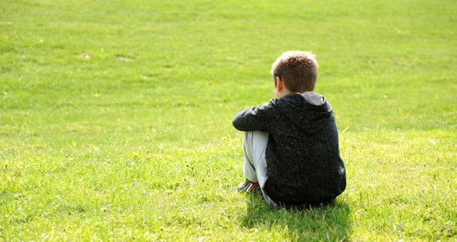 boy in grass