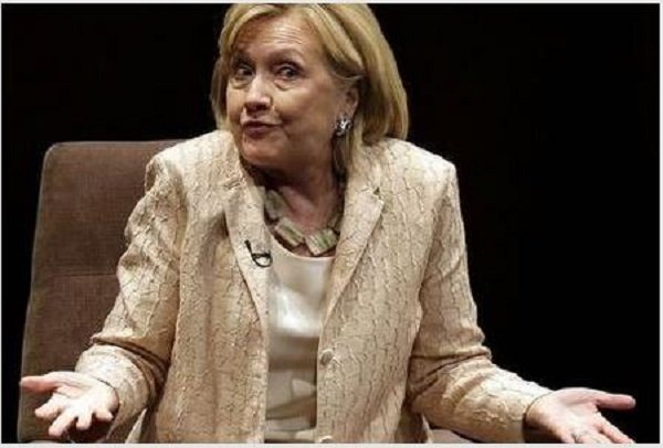 hillary shrugging