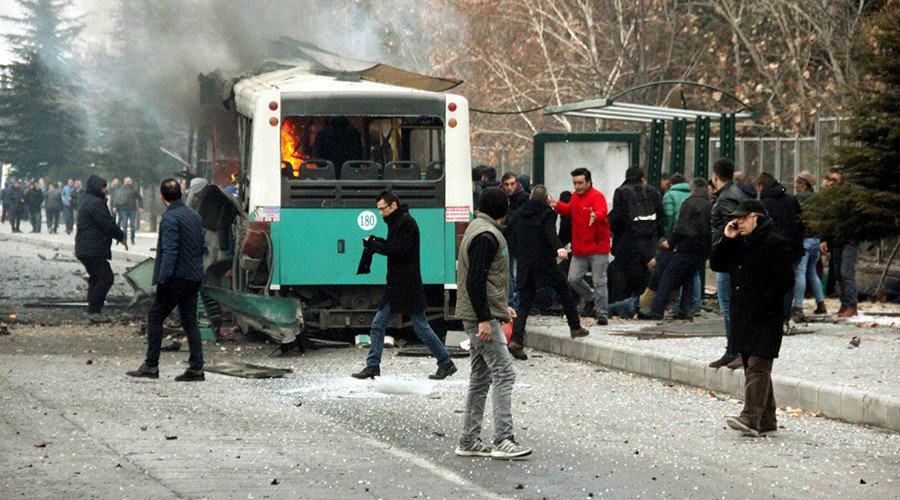 People react after a bus was hit by an explosion in Kayseri, Turkey, December 17, 2016