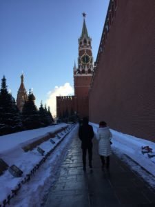 Couple walking along the Kremlin wall