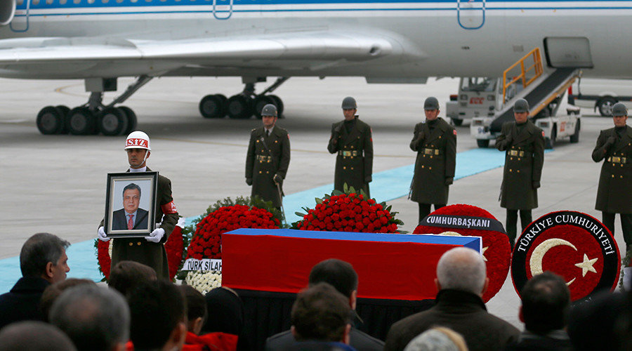 Click to enlarge Flag-wrapped coffin of late Russian Ambassador to Turkey Andrei Karlov