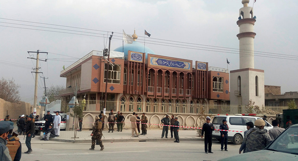 Afghan security forces keep watch in front of a mosque where an explosion happened in Kabul, Afghanistan November 21, 2016