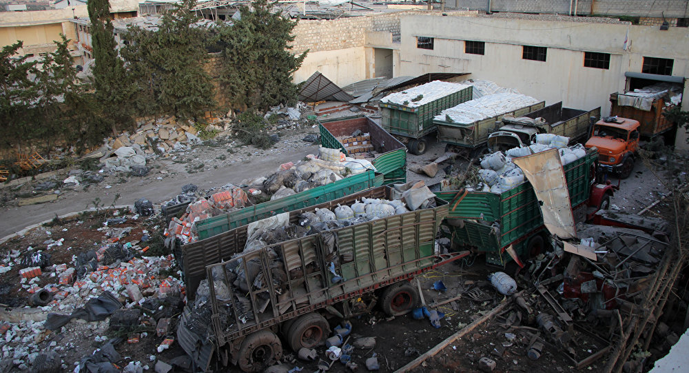 Click to enlarge Aid is seen strewn across the floor in the town of Orum al-Kubra on the western outskirts of the northern Syrian city of Aleppo on September 20, 2016, the morning after a convoy delivering aid was hit by a deadly air strike