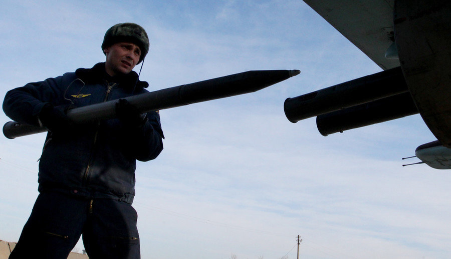 Click to enlarge An aviation specialists prepares a Russian Sukhoi Su-25 attack jet for tactical flight training