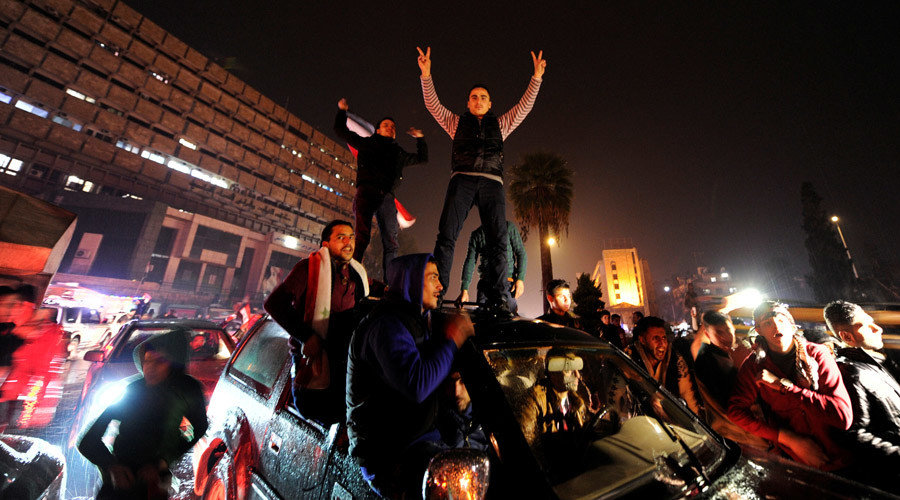 Click to enlarge Residents of Aleppo celebrate the liberation of their city by the Syrian army
