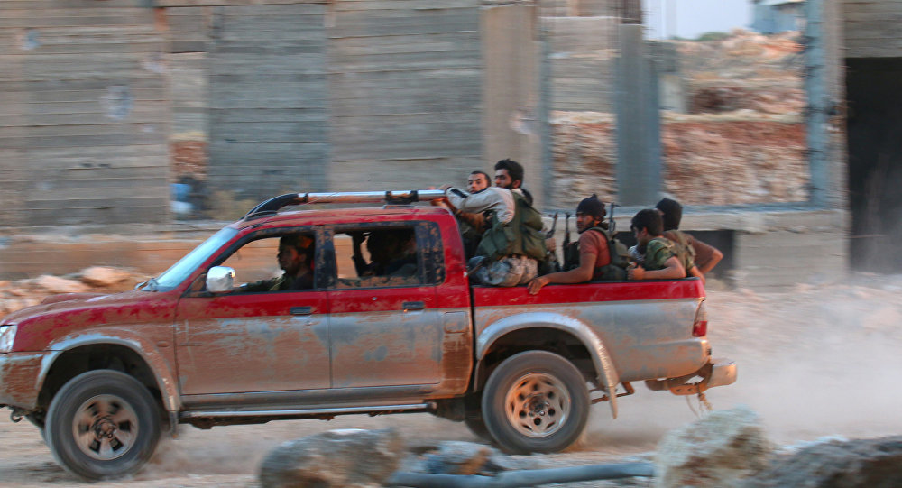 Click to enlarge Jabhat Fateh al-Sham militants
