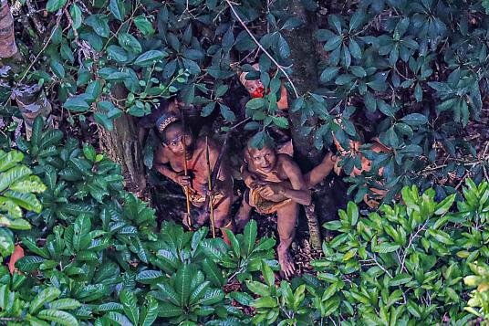 Click to enlarge Indians poised to shoot arrows