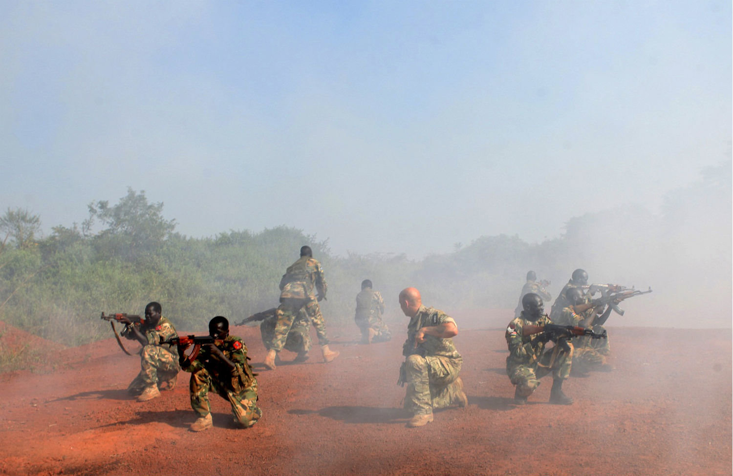 ﻿ A US Special Forces trainer supervises a military assault drill in Sudan in 2013