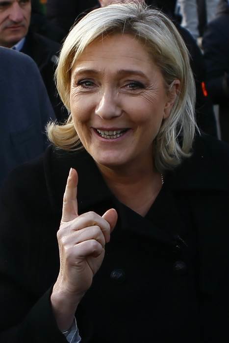 Click to enlarge Marine Le Pen visits a Christmas market in Paris on Dec. 8. Frances National Front finds support among millenials